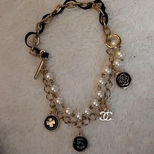 Cute gold toned triple chain charm bracelet